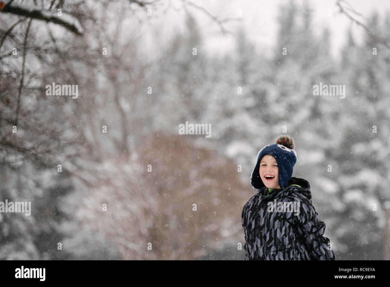 Boy in winter landscape Stock Photo