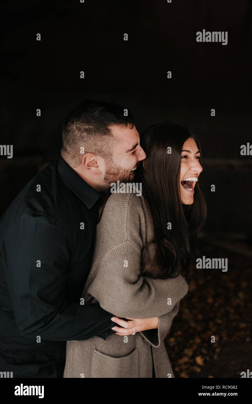 Happy smiling man hugs hi-res stock photography and images - Alamy