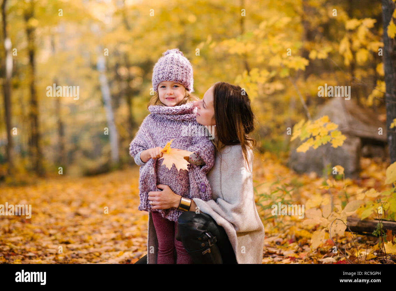 Mother and daughter in forest Stock Photo