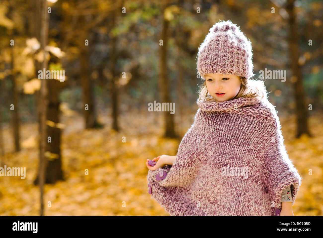 Little girl in forest Stock Photo