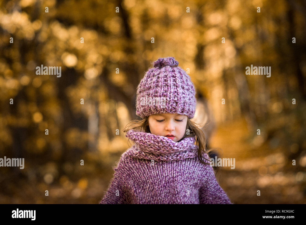 Little girl in forest Stock Photo