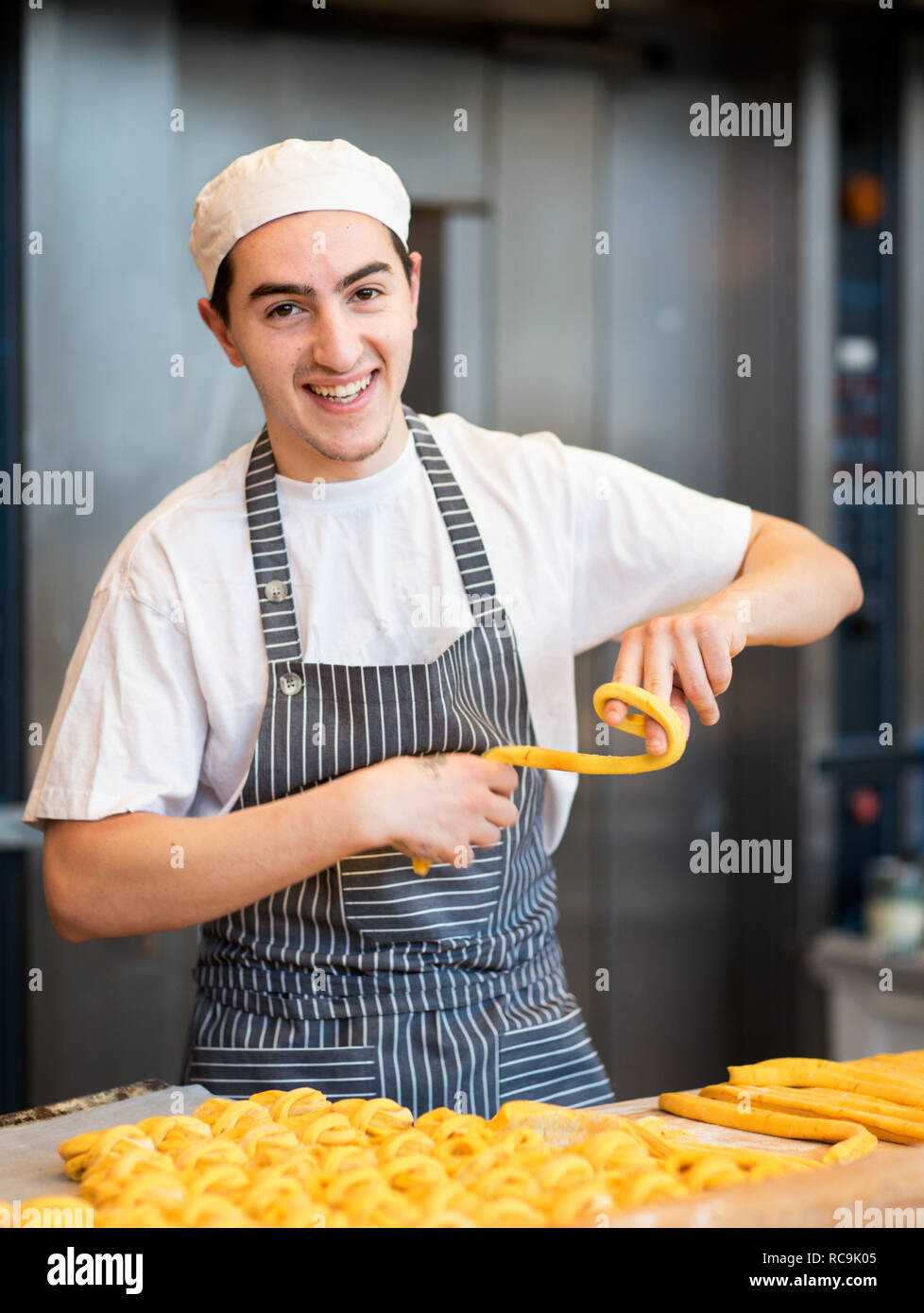 Baker working in bakery Stock Photo Alamy