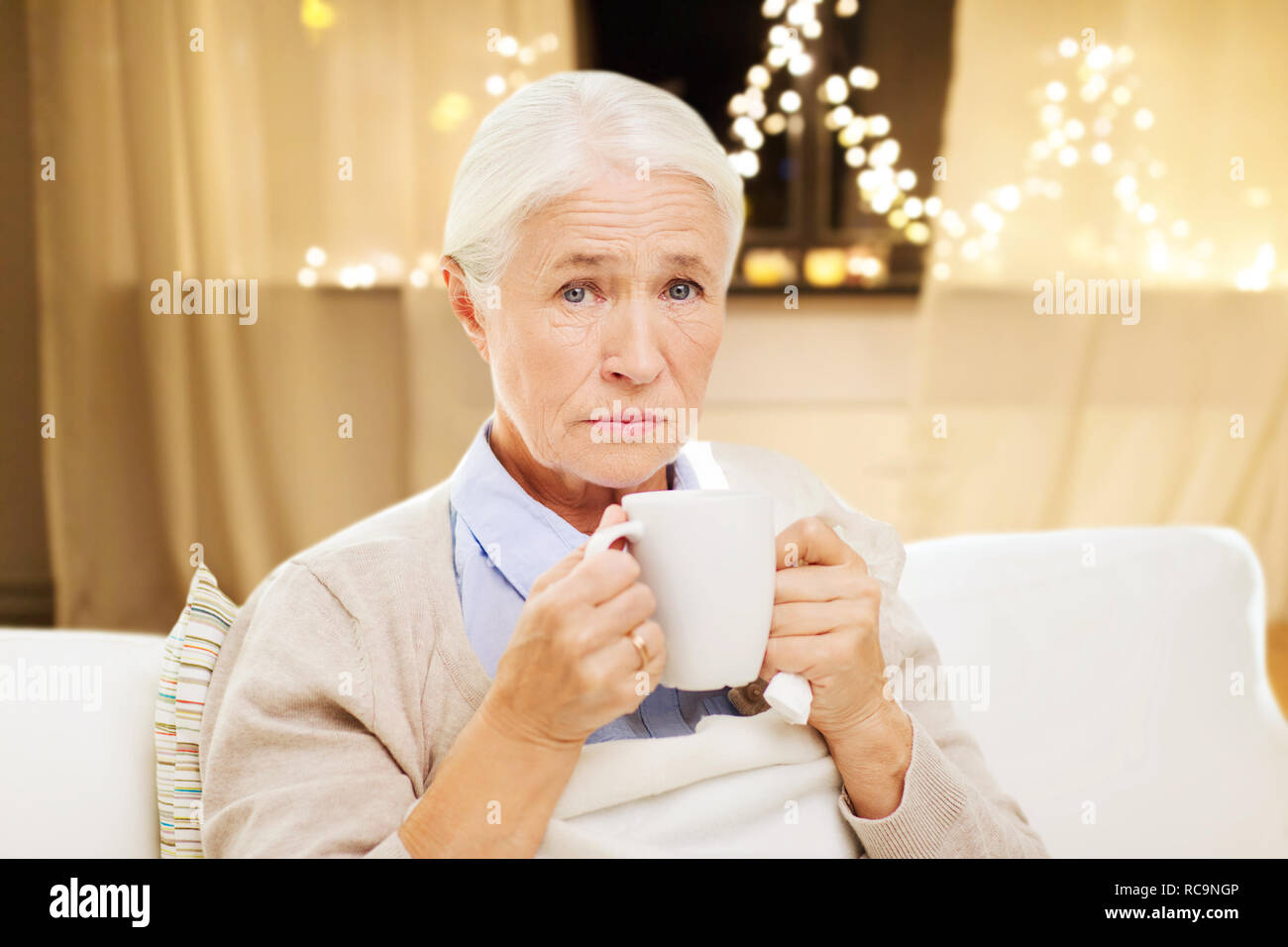 Old woman cup tea hi-res stock photography and images - Alamy