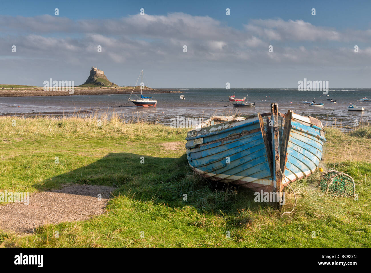 The Holy Island of Lindisfarne, also known simply as Holy Island, is a tidal island off the northeast coast of England in, Northumberland. Stock Photo