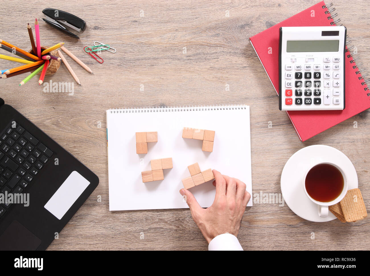Man Solving Puzzles On The Office Desk Stock Photo 231328698 Alamy