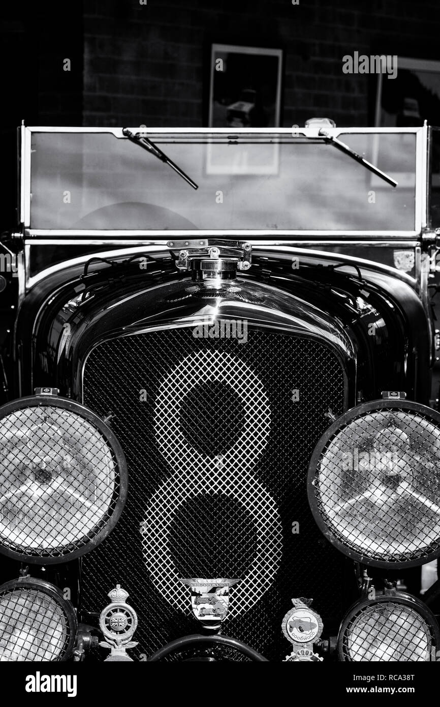 Vintage Bentley in a workshop at Bicester Heritage Centre. Oxfordshire, England. Black and White Stock Photo