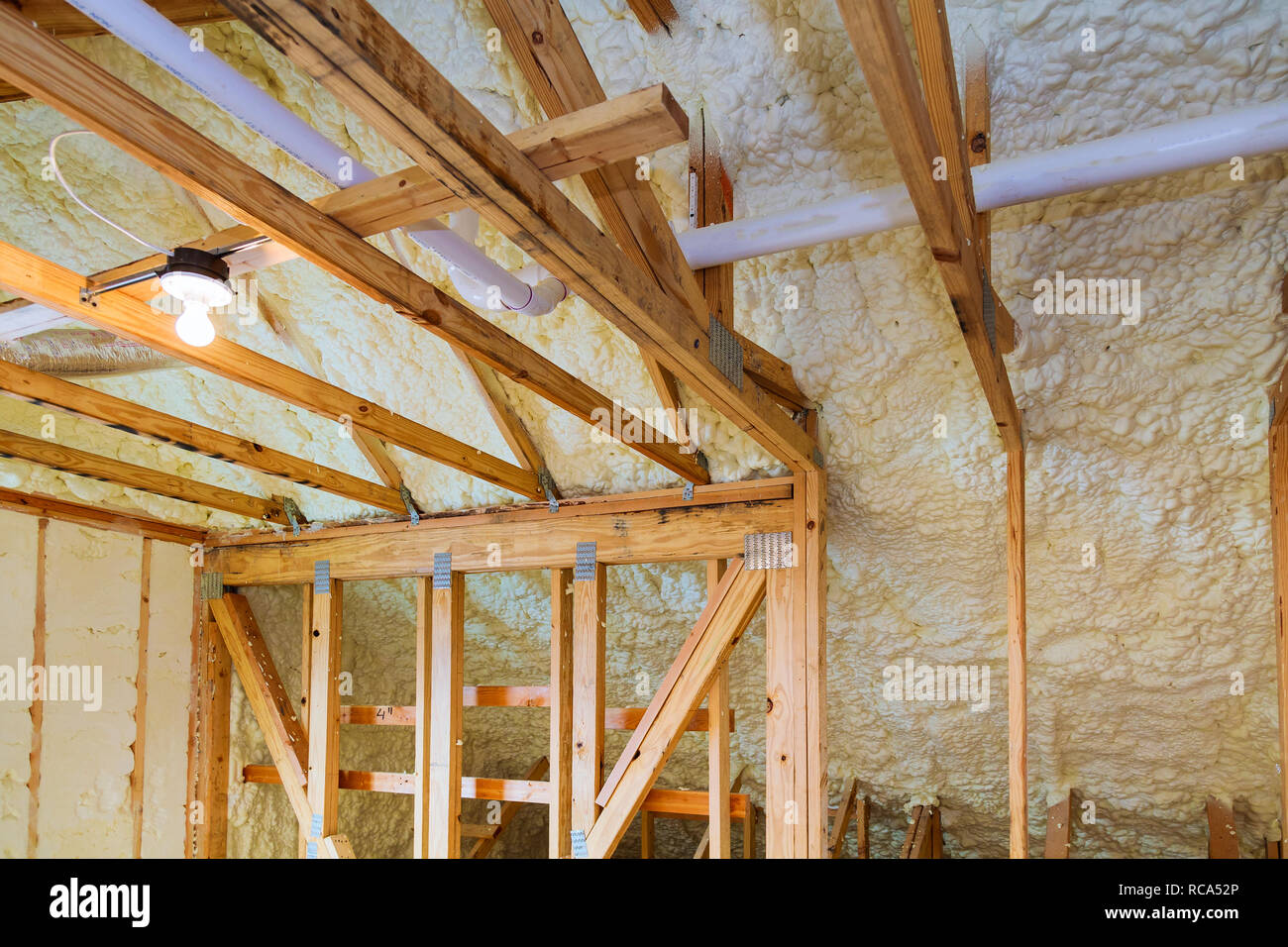 Foam Plastic Insulation Installed In The Sloping Ceiling Of