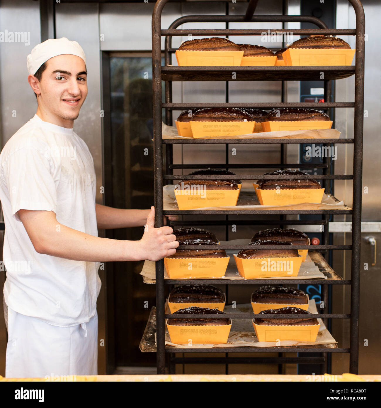 Baker working in bakery Stock Photo Alamy