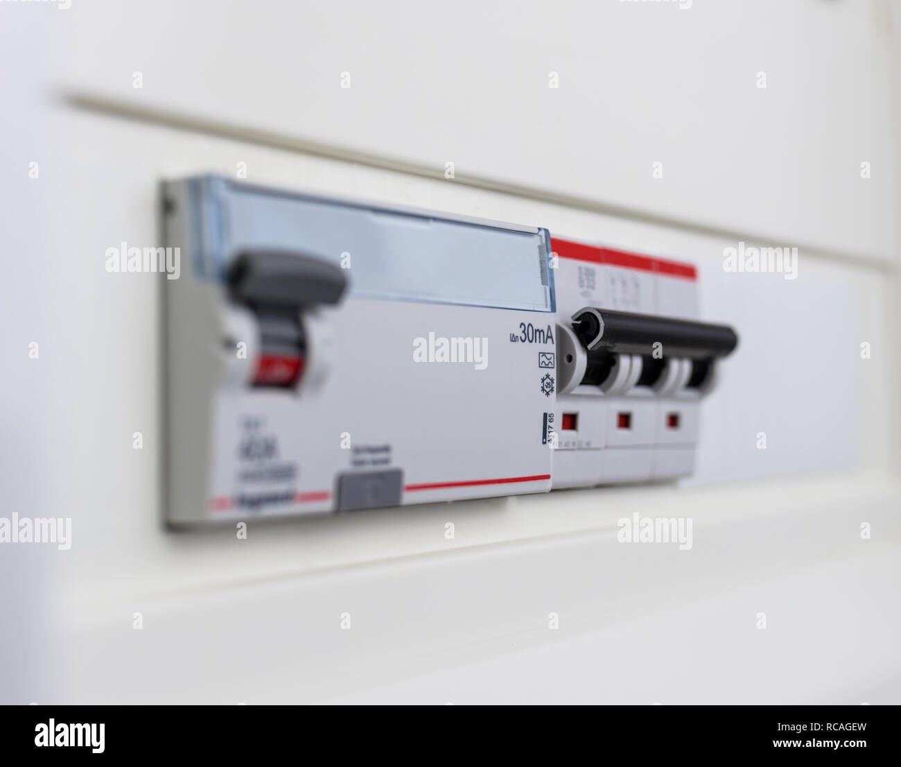 Automatic circuit breakers in a fuse box. Power control panel Stock