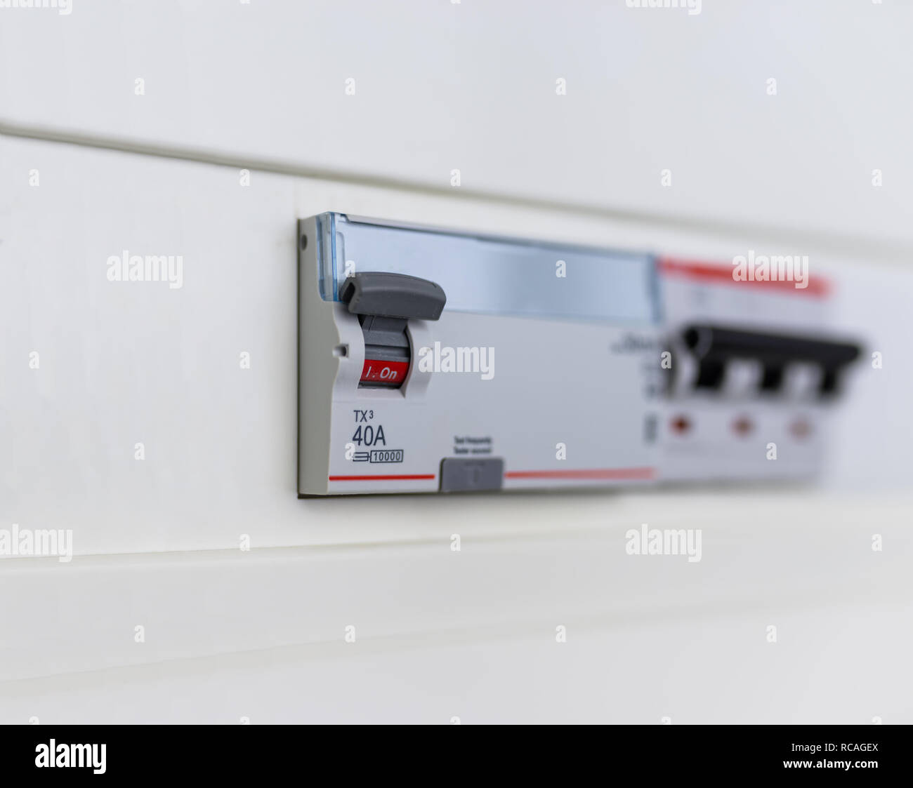 Automatic circuit breakers in a fuse box. Power control panel Stock
