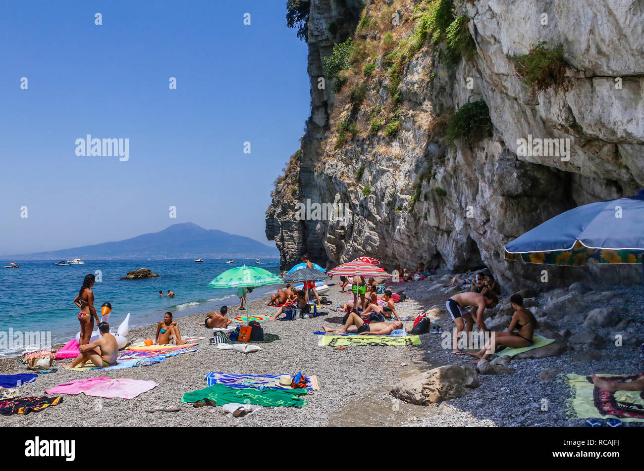 The beach on Amalfi Coast, the volcano Mount Vesuvius in the background