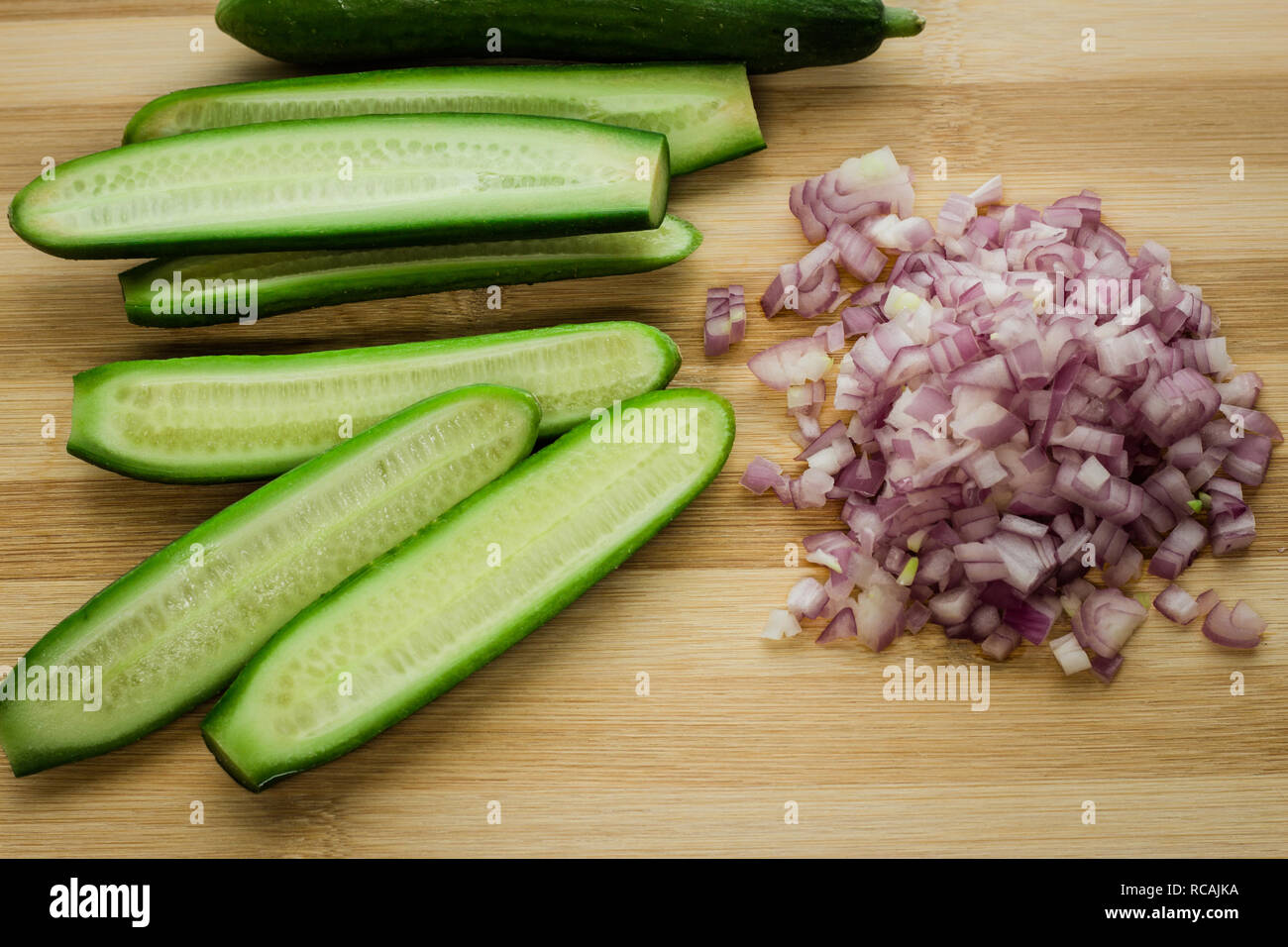 Mini cucumbers and zesty diced shallots Stock Photo Alamy