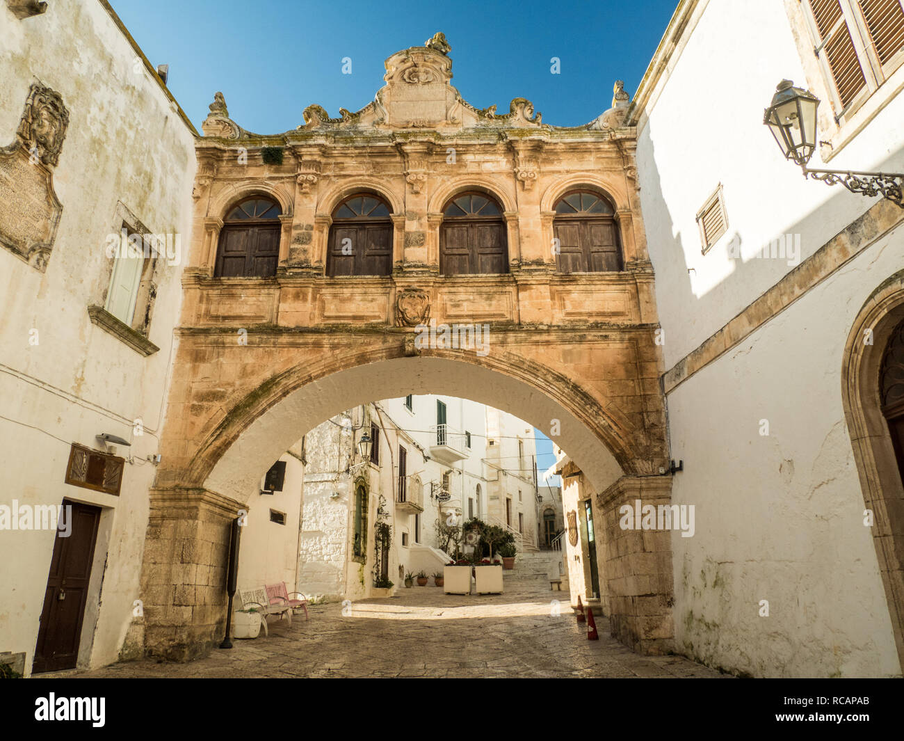 Quaint street leading to the Cathedral in Ostuni, Apuglia, Italy Stock Photo