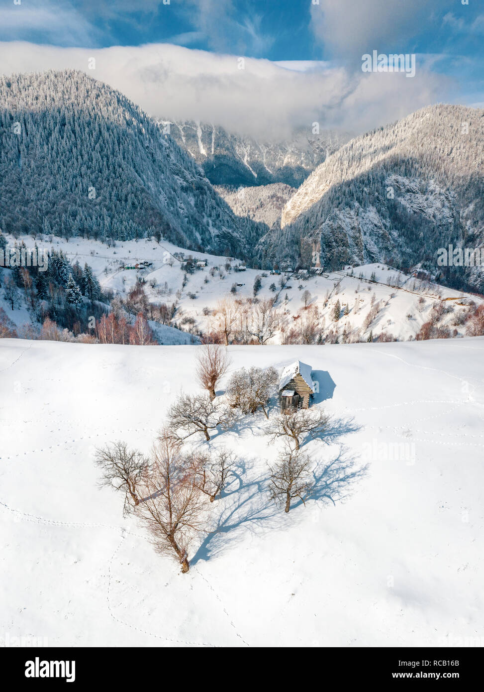Winter Carpathian Mountains in Pestera Village Romania Stock Photo