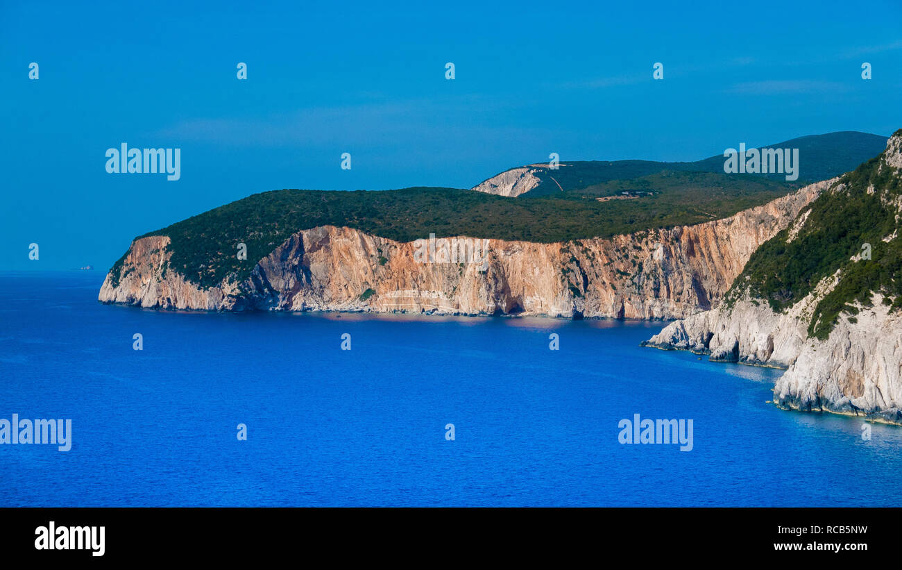 Amazing views of crystal clear milky blue waters of exotic Lefkada beaches and breathtaking cliffs in Greece. Stock Photo