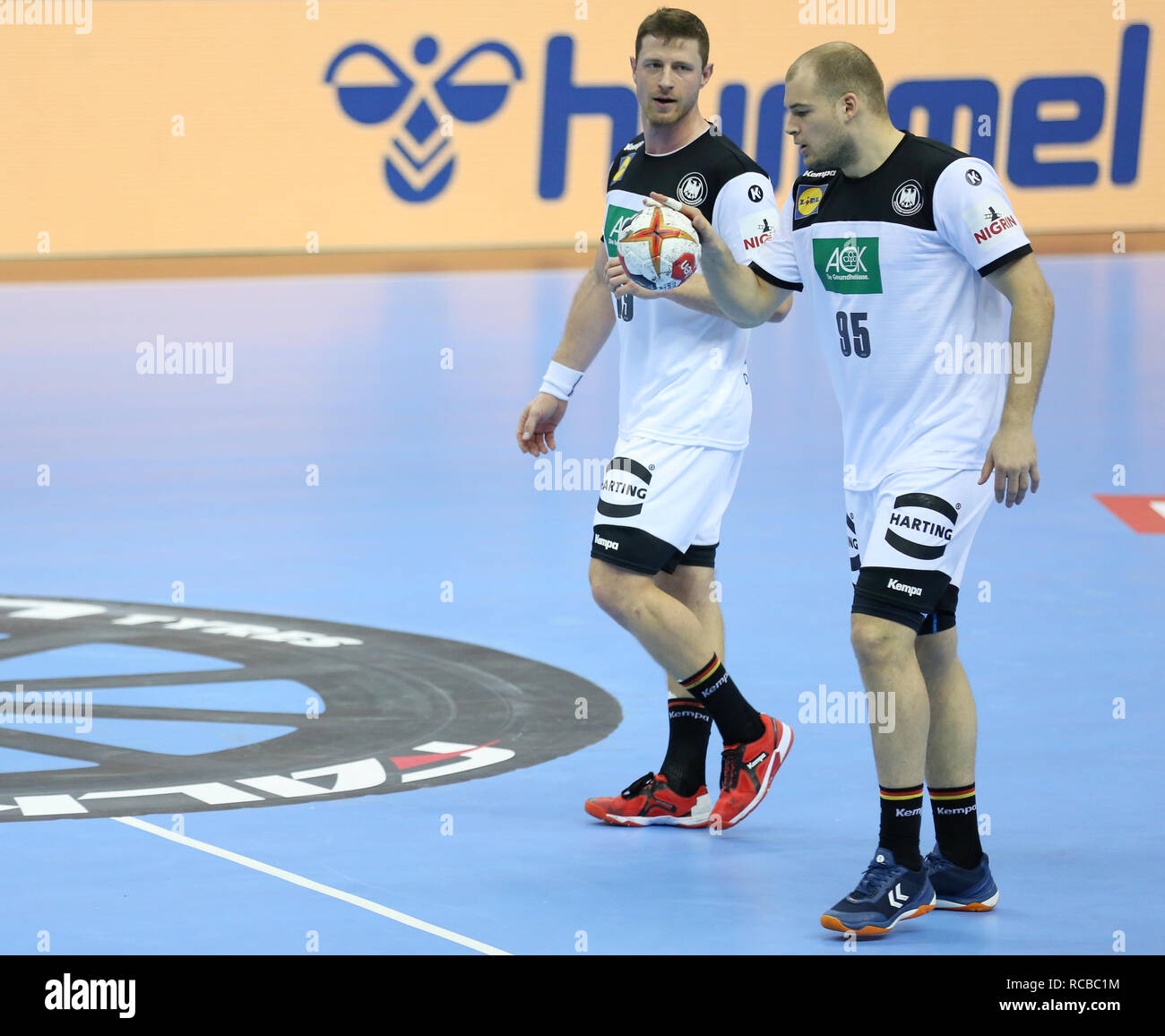 Berlin, Germany. 14th Jan, 2019. Handball IHF Men's World Championship: Russia v Germany. Martin Strobel (19) and Paul Drux (95) for Germany Credit: Mickael Chavet/Alamy Live News Stock Photo