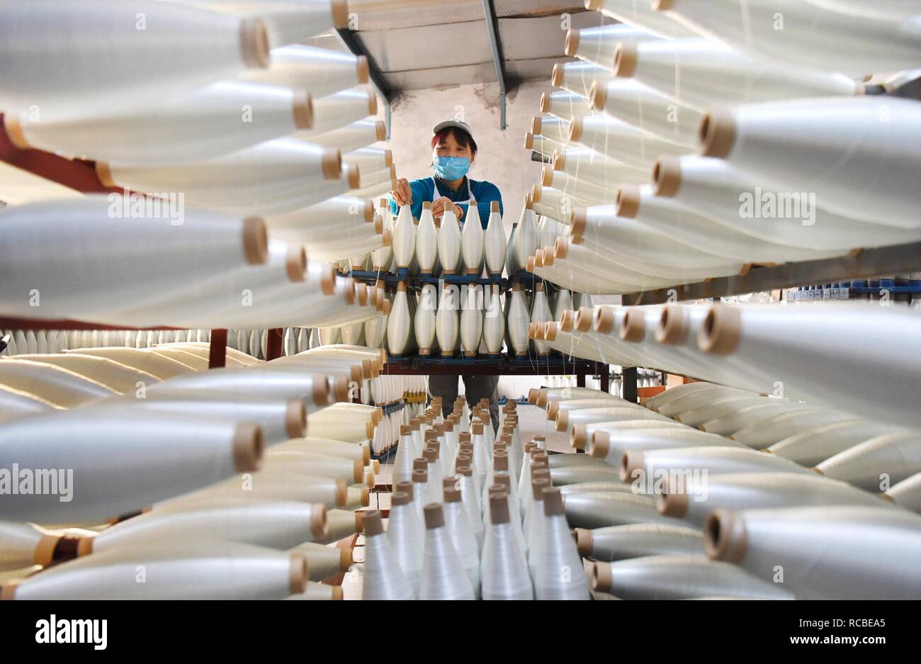 (190115) -- BEIJING, Jan. 15, 2019 (Xinhua) -- A worker arranges fiberglass products for export at the economic development zone in Yiyuan County, east China's Shandong Province, Nov. 12, 2018. Over 80 companies in Yiyuan have developed their export business. China's foreign trade rose 9.7 percent year on year to a historic high of 30.51 trillion yuan (about 4.5 trillion U.S. dollars) in 2018, the General Administration of Customs (GAC) said Monday. Exports rose 7.1 percent year on year to 16.42 trillion yuan last year, while imports grew 12.9 percent to 14.09 trillion yuan, resulting Stock Photo