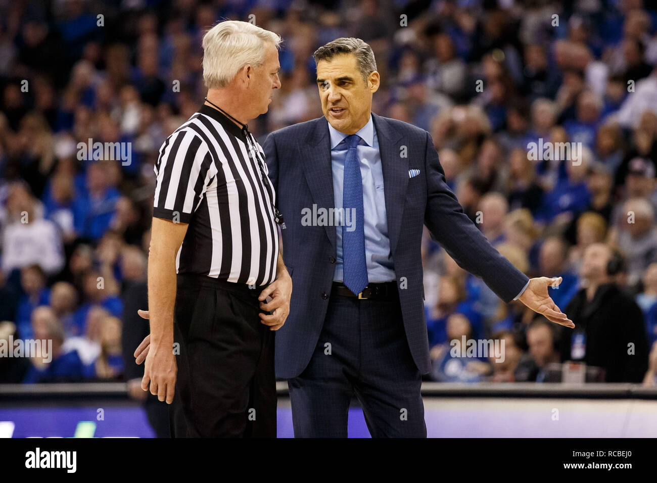 Omaha, NE . 13th Jan, 2019. Villanova Wildcats head coach Jay Wright  speaks game official Brian O'Connell in action during an NCAA men's  basketball game between the Villanova Wildcats and Creighton Bluejays