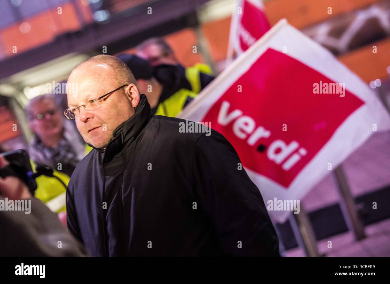 Munich, Bavaria, Germany. 15th Jan, 2019. Kai Winkler of the Verdi union at the Munich International Airport. Citing a breakdown in talks with employers on December 21st, the German Ver.di union organized the latest warning strike in a series at the Munich International Airport with members employed in Airport Security Services (Luftsicherheit) walking out from 3:30am to 24:00. The union is demanding 20 Euros per hour for their 1,000 total members working in Passenger-, Freight, Personnel, and Goods Control of Airport Security, along with recertification to bring other members to the same Stock Photo