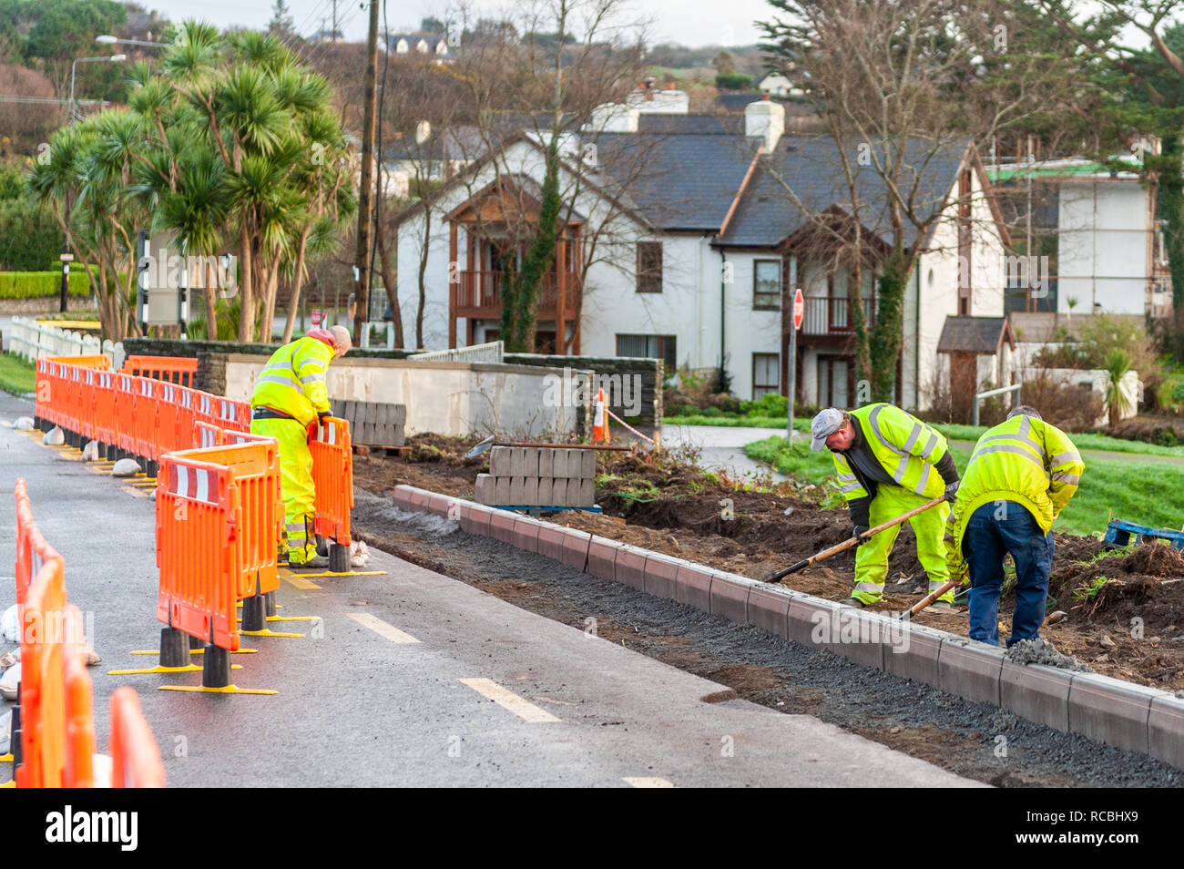 Schull, West Cork, Ireland. 15th Jan, 2019. Cork County Council workmen prepare the ground for a new pavement to be installed and the road to be widened. Credit: Andy Gibson/Alamy Live News Stock Photo