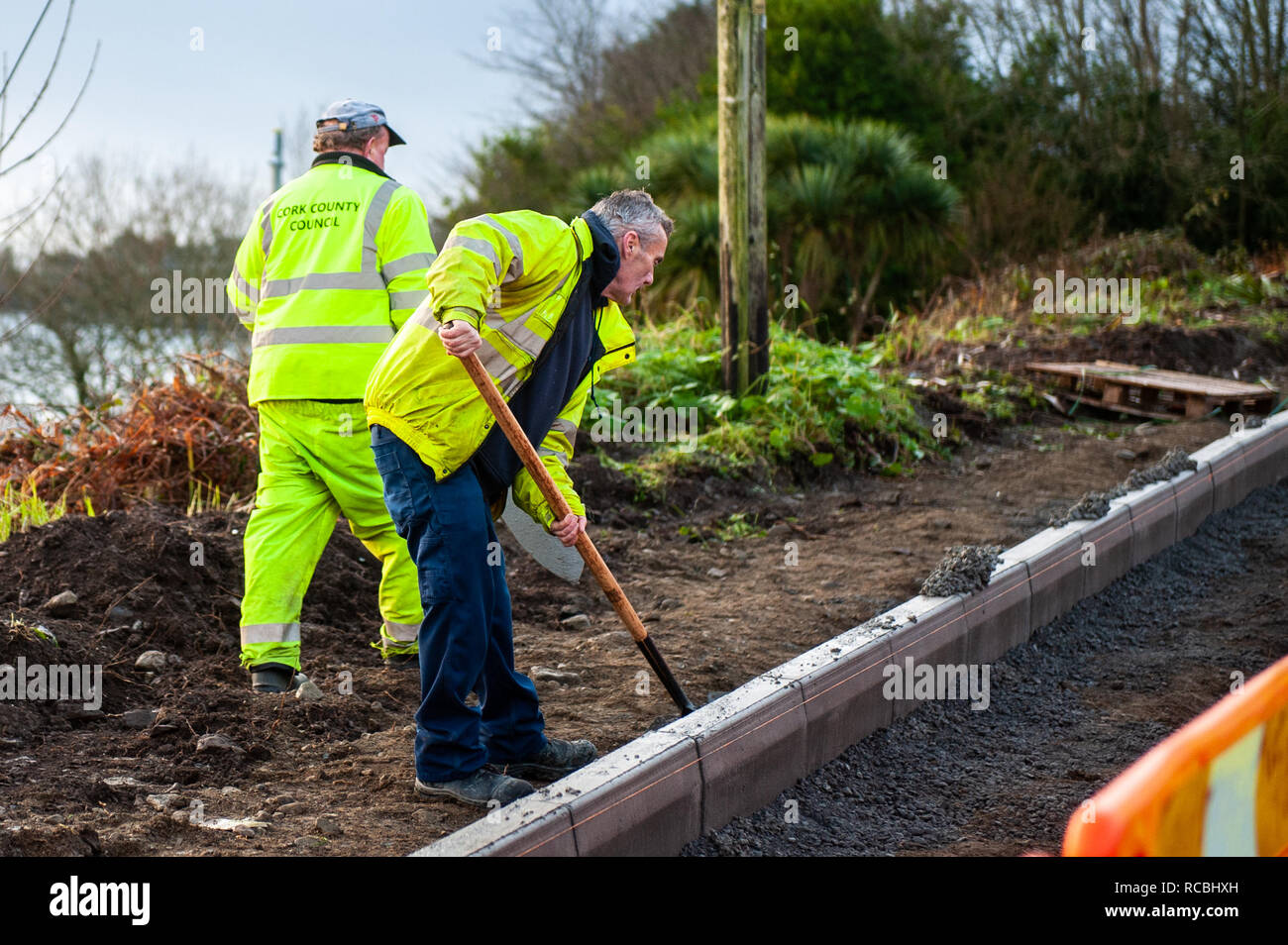 Schull, West Cork, Ireland. 15th Jan, 2019. Cork County Council workmen prepare the ground for a new pavement to be installed and the road to be widened. Credit: Andy Gibson/Alamy Live News Stock Photo