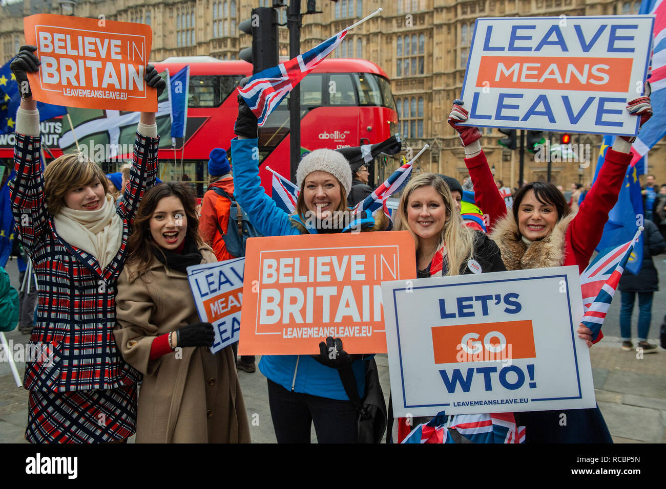 London, UK. 15th January, 2019. Leave means leave and SODEM, pro EU, protestors continue to make their points, side by side, outside Parliament as the vote on Theresa May's plan is due the next day. Credit: Guy Bell/Alamy Live News Stock Photo
