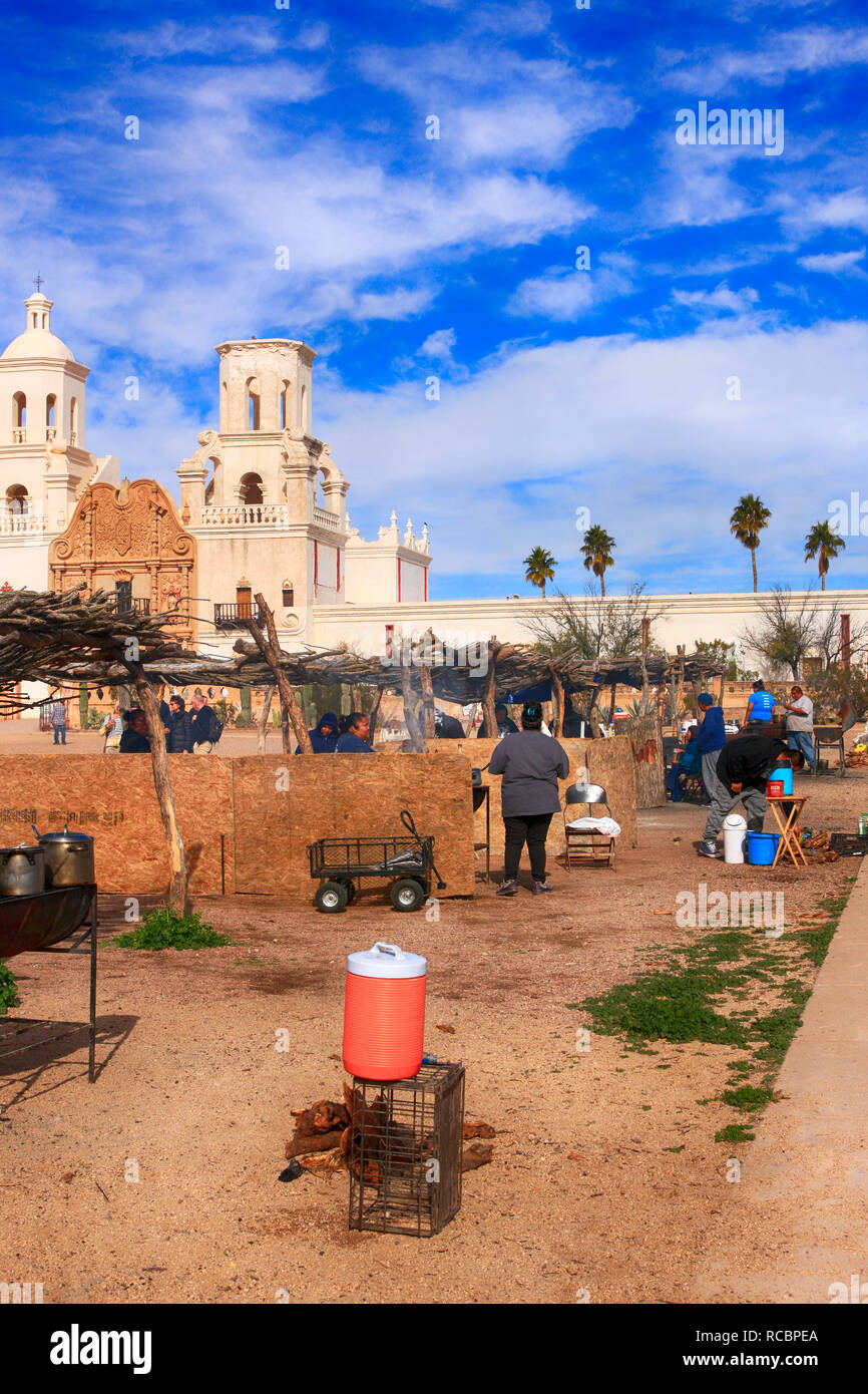 Native American Indians of the Tohono O'odham nation selling fry bread outside the Mission San Xavier del Bac in Arizona Stock Photo