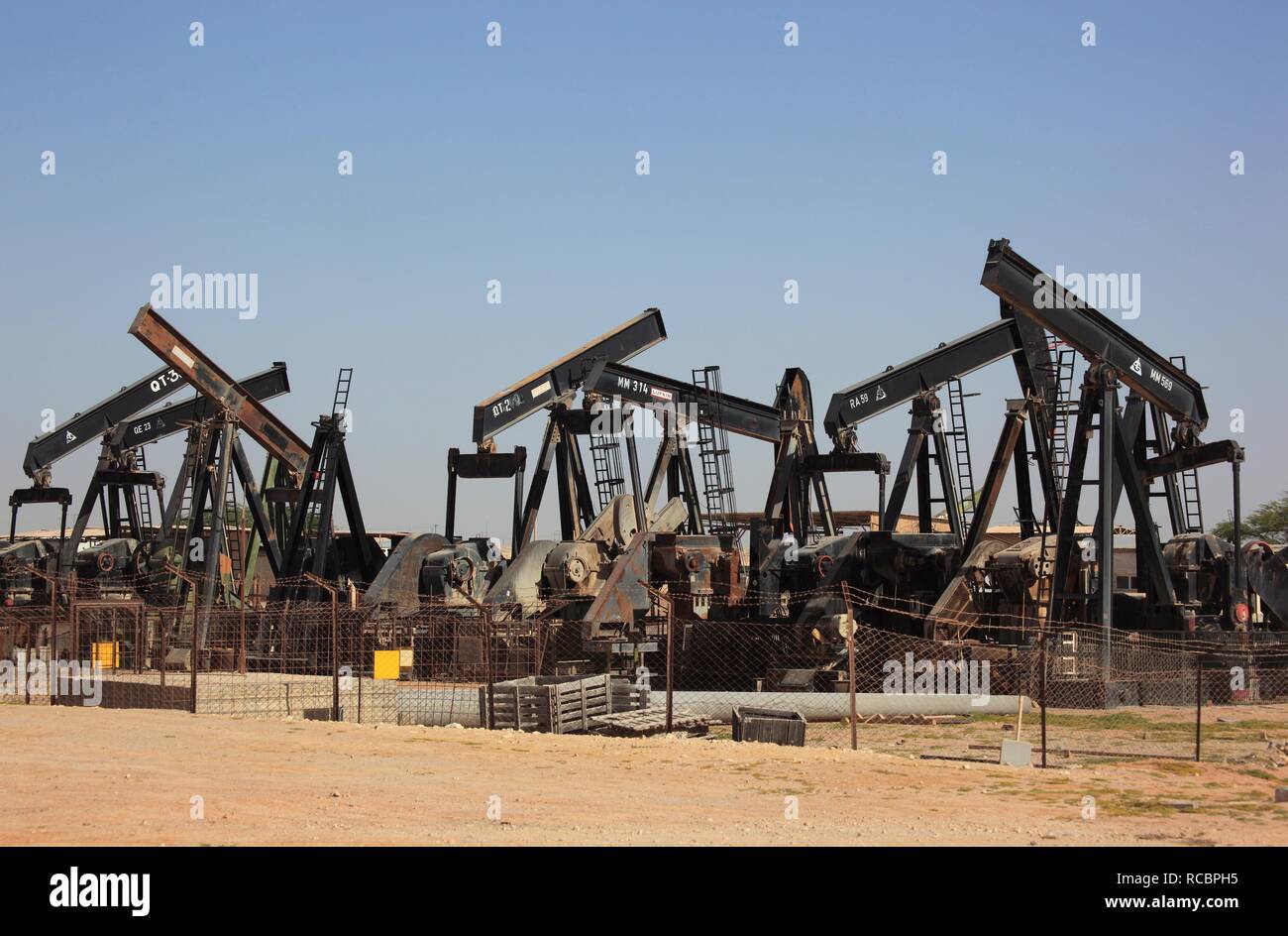 Depot with worn-out oil pumps near Marmul, Oman, Arabian Peninsula, Middle East, Asia Stock Photo