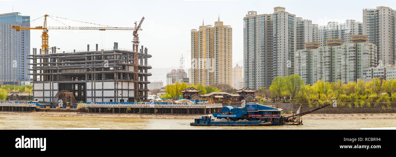 LANZHOU, CHINA-APRIL 12,2015: Clean up process of the Yellow River (Huang He) in the vicinity of the Lanzhou. Stock Photo