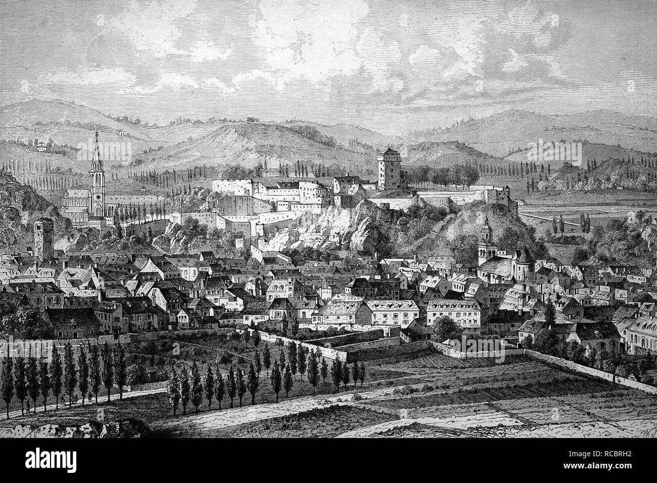 View over the pilgrimage town of Lourdes, France, historical wood engraving, 1886 Stock Photo