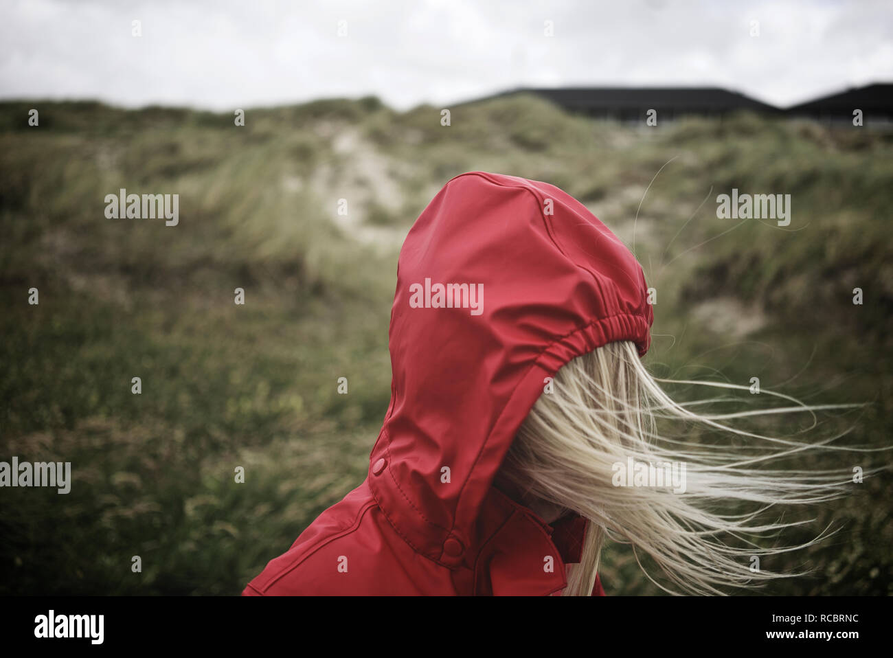 Girl wearing hood Stock Photo Alamy