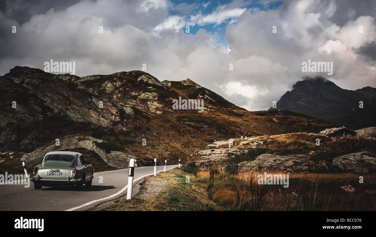 Aston Martin DB5 driving through St bernadino pass Stock Photo