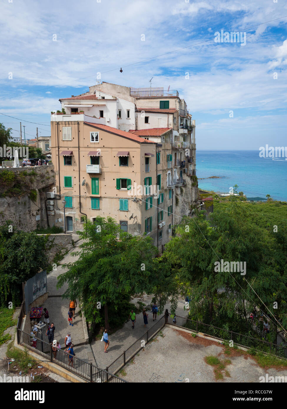 Tropea, Italy - August 21, 2018: View of Tropea, a tourist resort in southern Italy perched on a cliff overlooking the sea. Stock Photo
