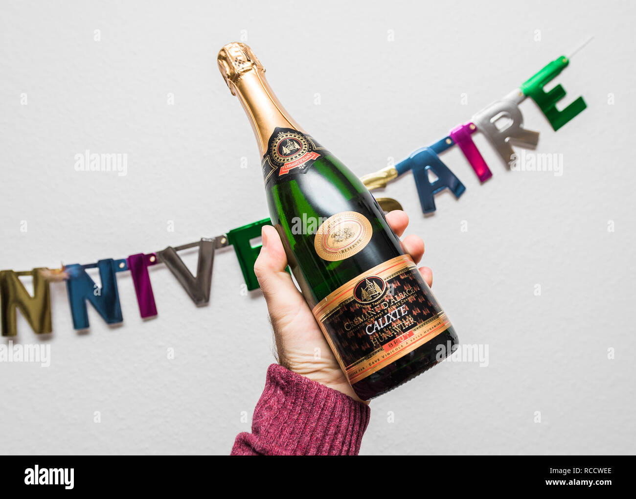 Paris France Jan 6 18 Cremant D Alsace Calixte Hunawihr In Male Hand Against Joyeux Anniversaire Text Translated As Happy Birthday Party Stock Photo Alamy