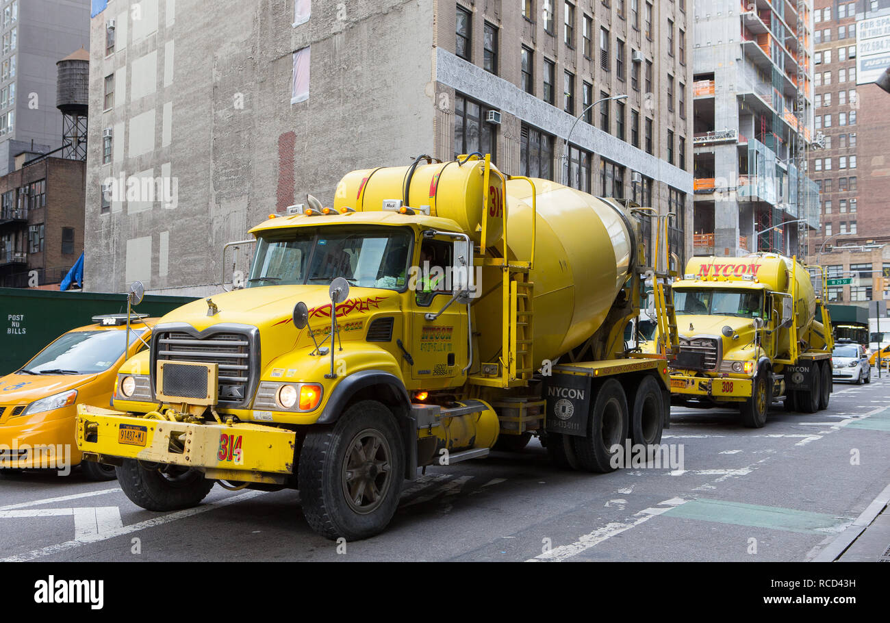 Two NYCON (Nycon New York Concrete Supply) Mack granite cement mixer
