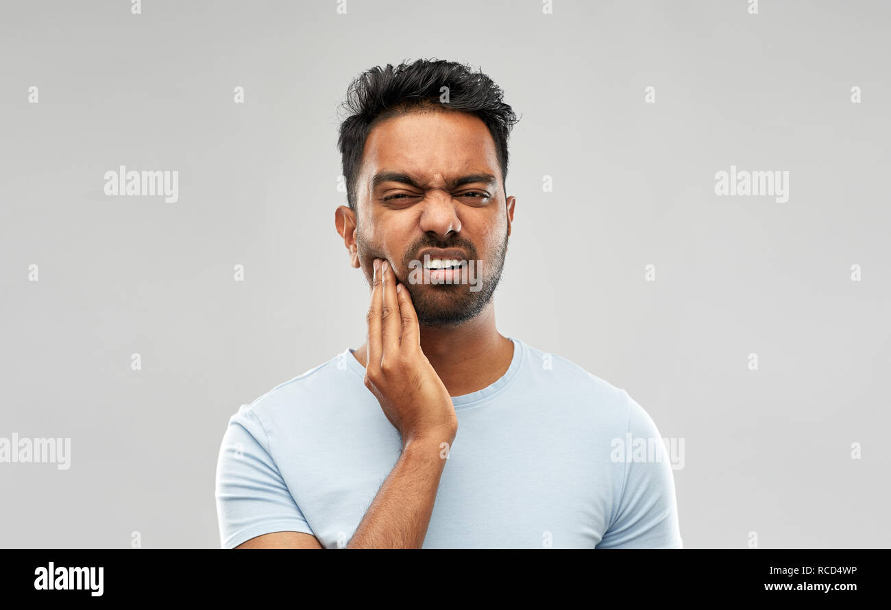 indian man suffering from toothache Stock Photo Alamy