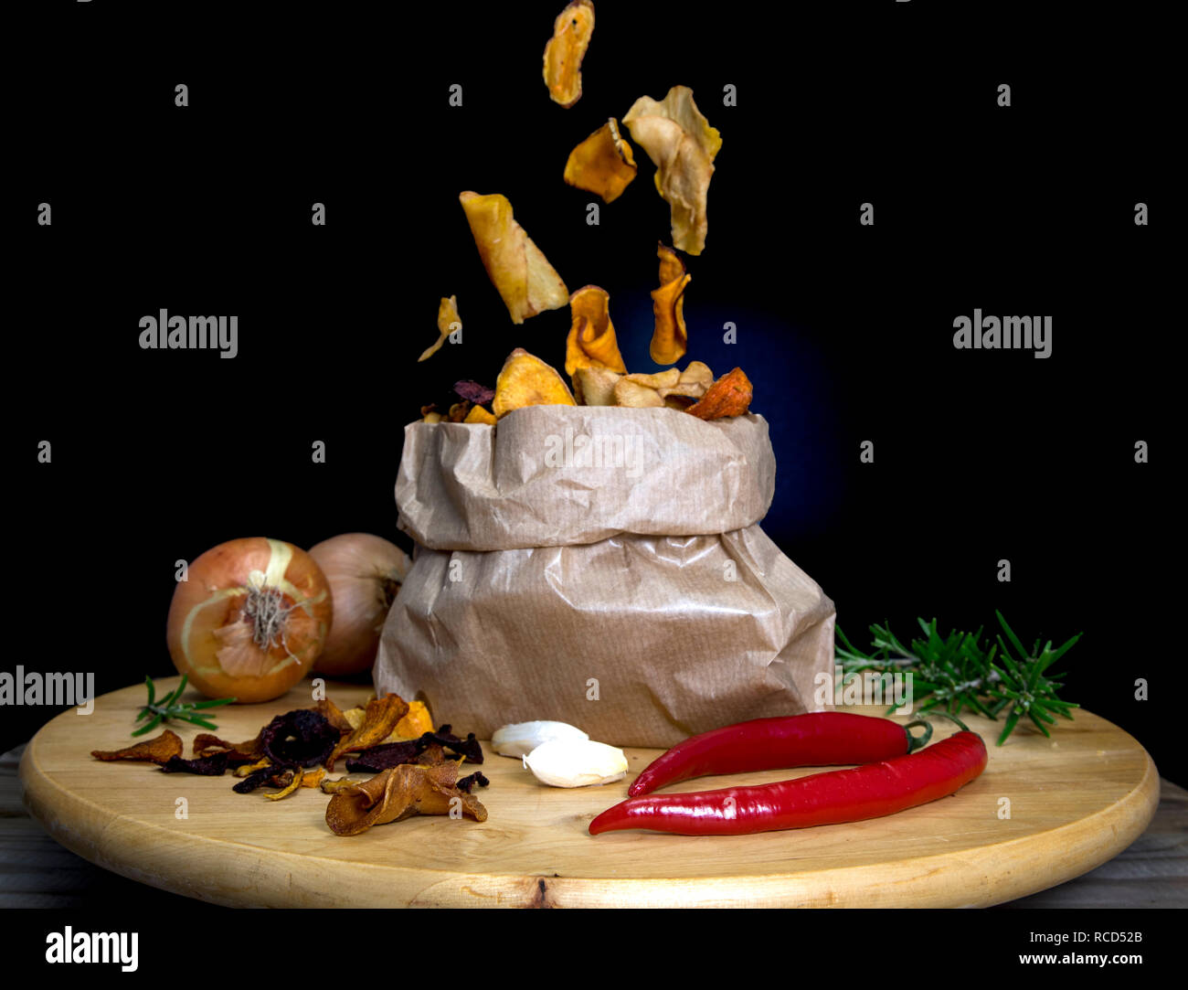 healthy chips made from vegetables or vegetable chips falling in a