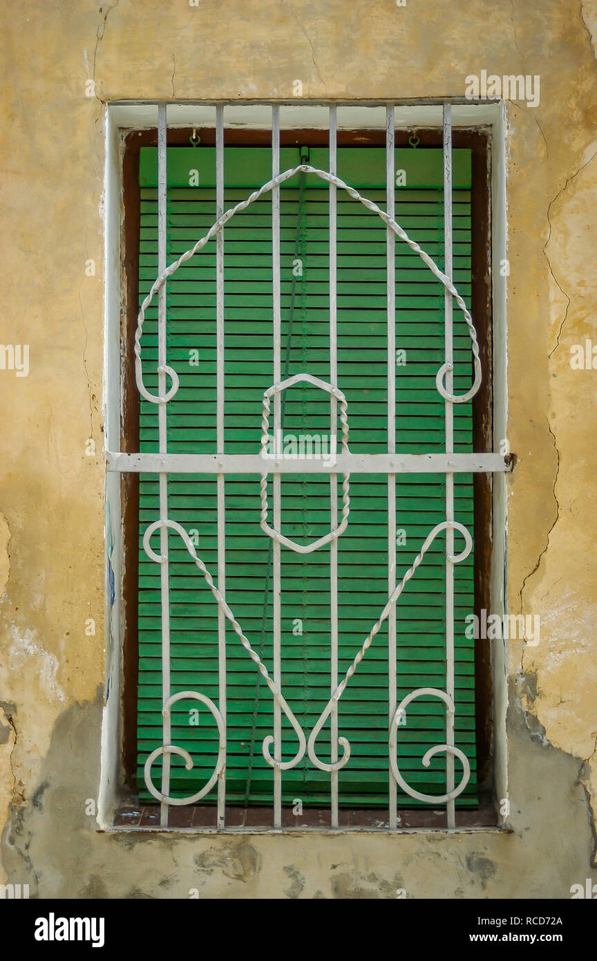 Security Bars protecting a house Door Stock Photo Alamy