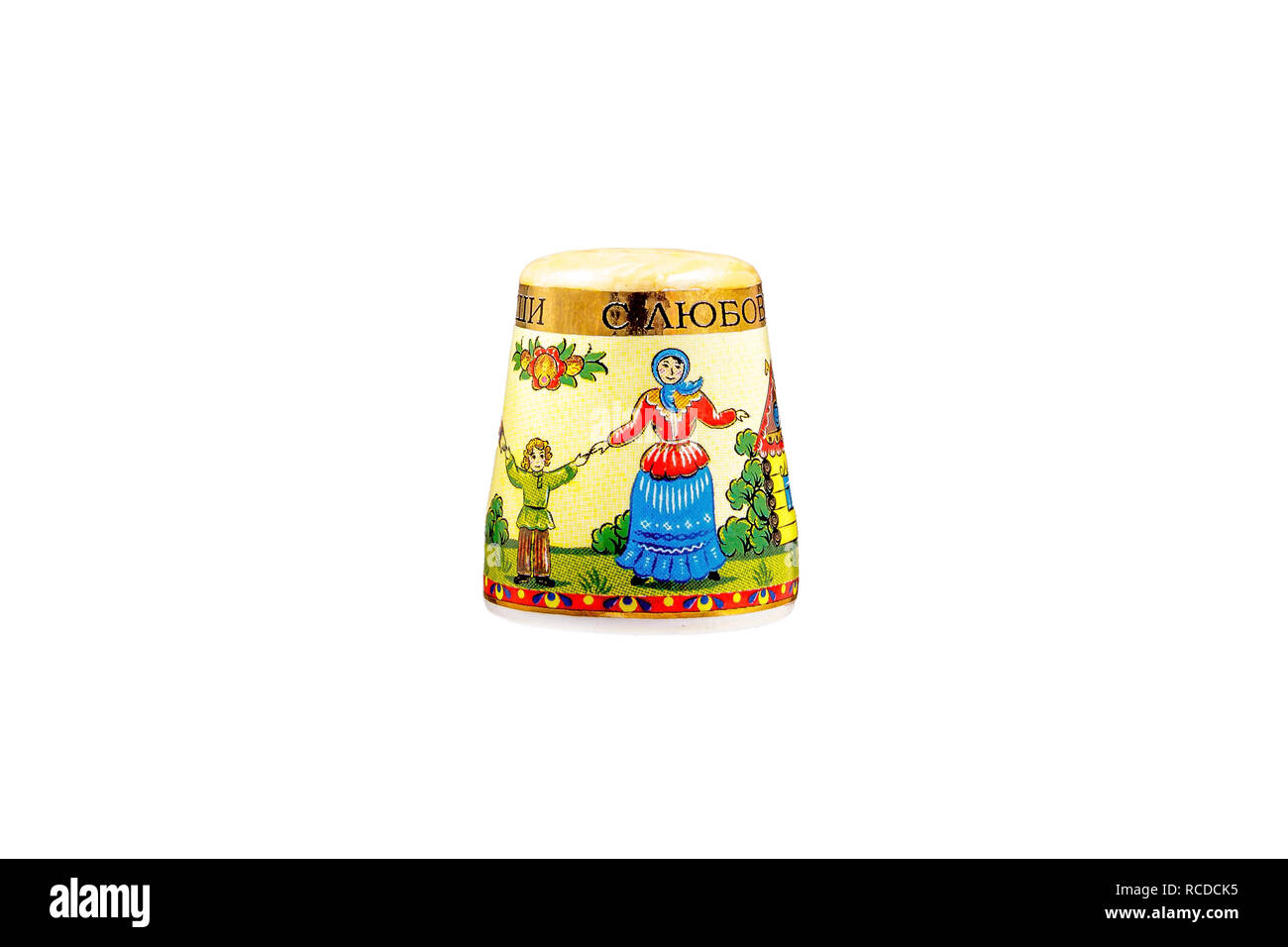 ceramic souvenir toy in the form of thimble with beautiful color painting on isolated white background reflecting the national Russian culture with th Stock Photo