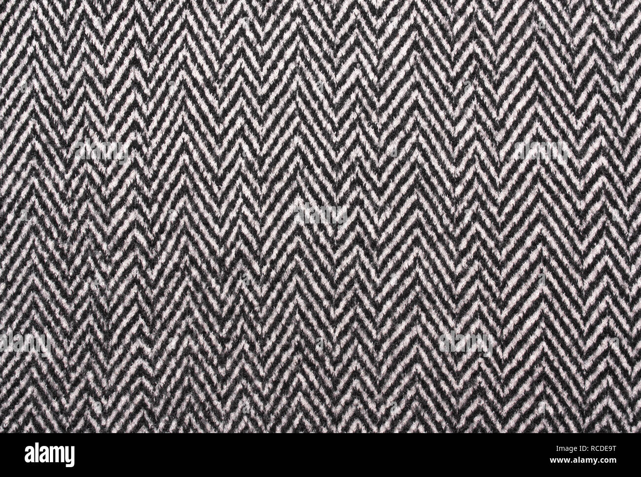 Herringbone  Tweed coat background. Gray warm, soft wool fabric Stock Photo