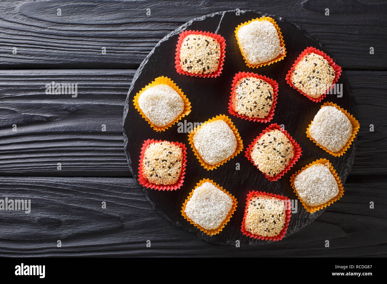 Traditional Asian mochi dessert with bean paste close-up on the table