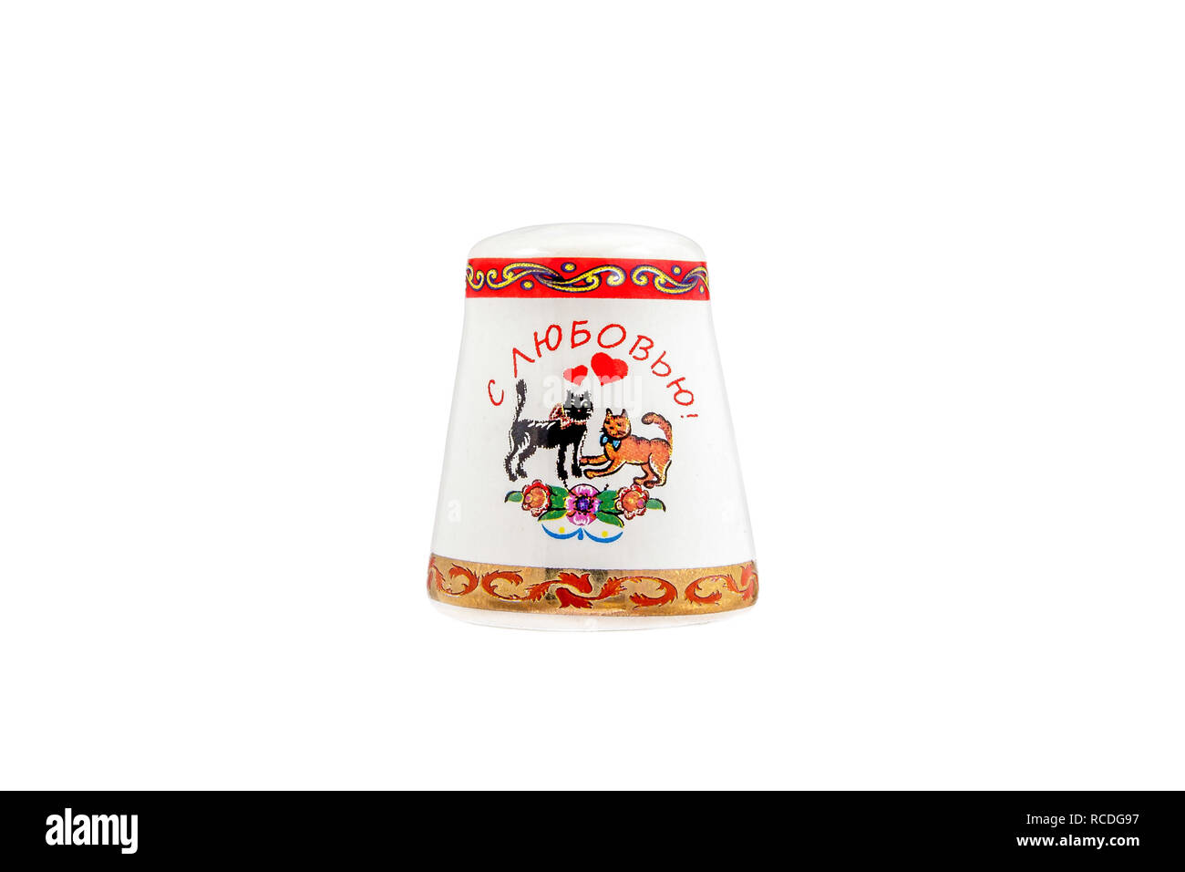 ceramic souvenir toy in the form of thimble with beautiful color painting on isolated white background reflecting the national Russian culture with th Stock Photo