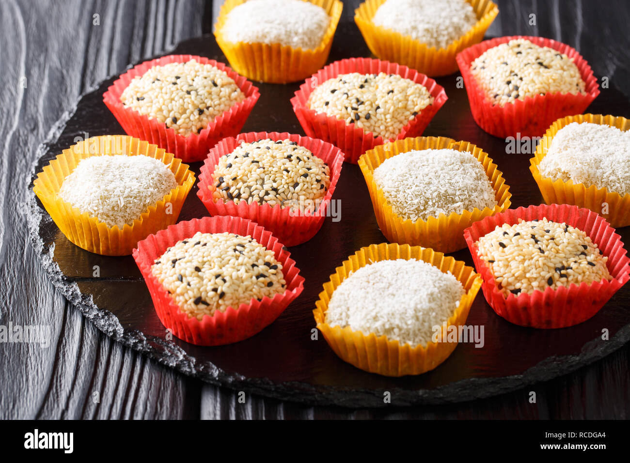 Sweet Japanese Mochi Ice Cream in Many Flavours close-up on the table. horizontal Stock Photo