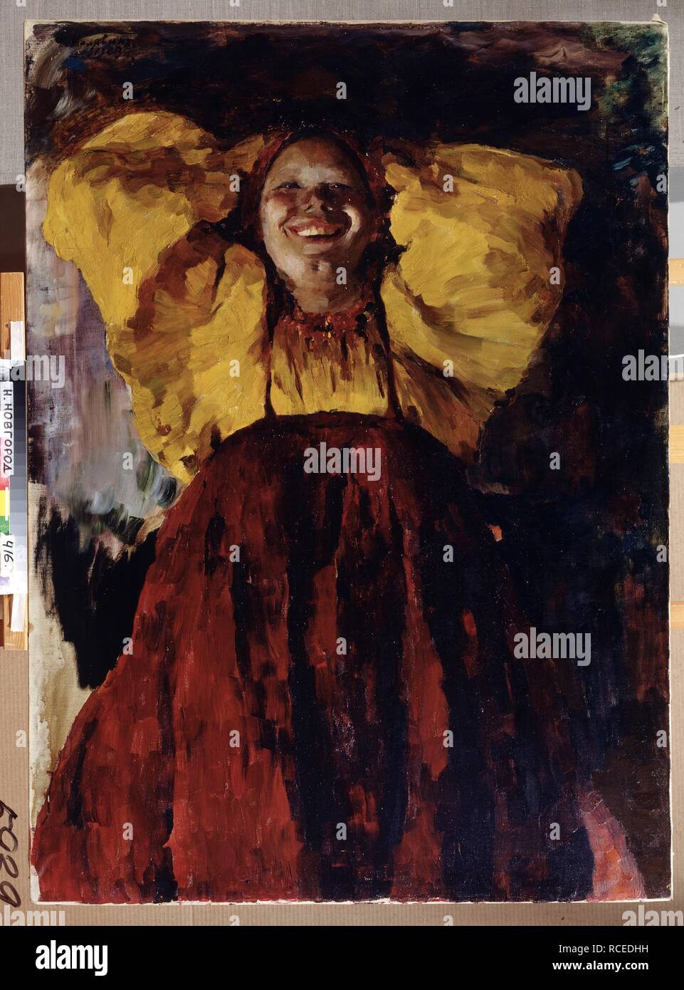 Woman in Yellow. Museum: State Art Museum, Nizhny Novgorod. Author: Malyavin, Filipp Andreyevich. Stock Photo