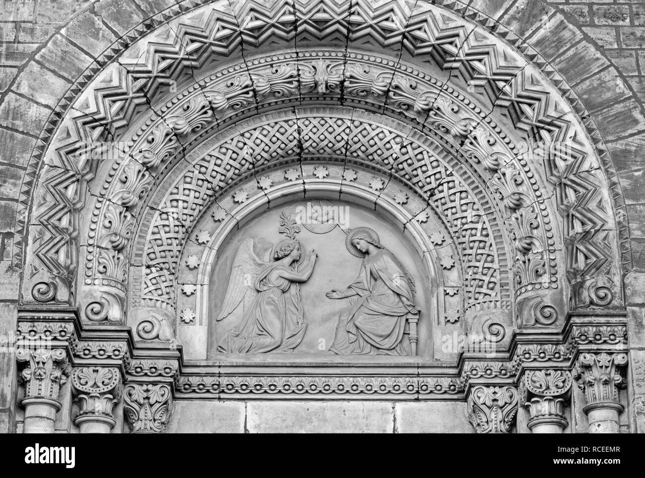 PRAGUE, CZECH REPUBLIC - OCTOBER 17, 2018: The relief of Annunciation on the portal of the church kostel Svatého Cyrila Metodeje by Václav Levý Stock Photo