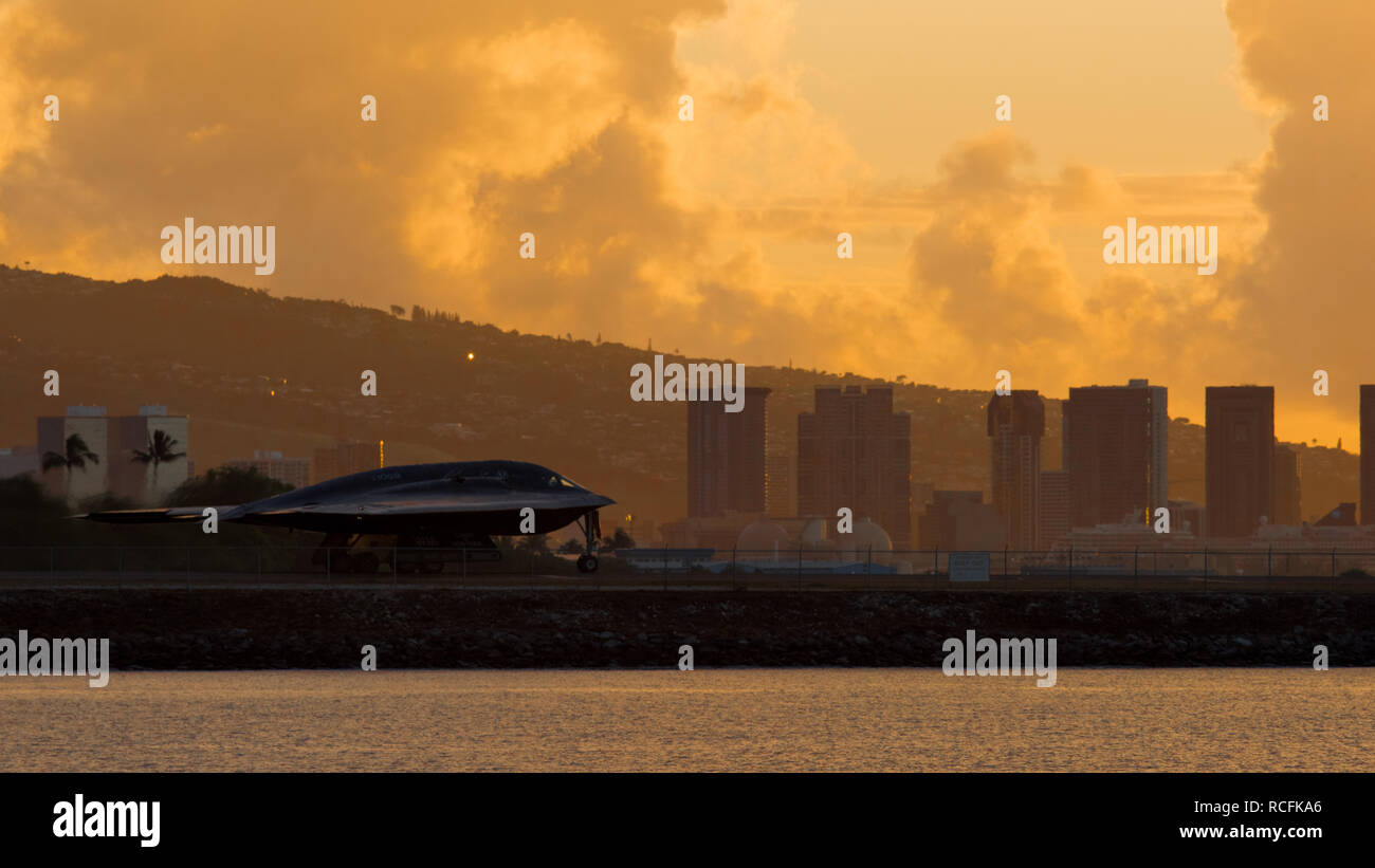 A U.S. Air Force B-2 Spirit bomber deployed from Whiteman Air Force Base, Missouri, prepares to take off from Joint Base Pearl Harbor-Hickam ( JBPH-H), Hawaii, Jan. 14, 2019. Three B-2 Bombers arrived to JBPH-H on Jan. 10, 2019 in support of U.S. Strategic Command’s (USSTRATCOM) bomber task force mission. Stock Photo