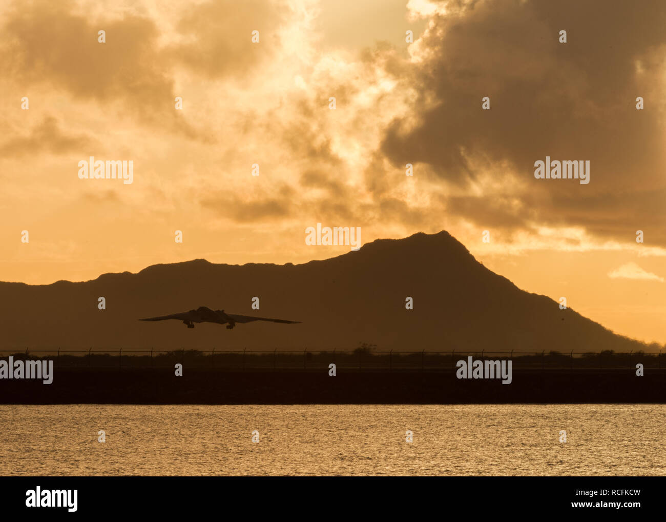 A U.S. Air Force B-2 Spirit bomber deployed from Whiteman Air Force Base, Missouri, takes off from Joint Base Pearl Harbor-Hickam ( JBPH-H), Hawaii, Jan. 14, 2019. Three B-2 Bombers arrived to JBPH-H on Jan. 10, 2019 in support of U.S. Strategic Command’s (USSTRATCOM) bomber task force mission. Stock Photo