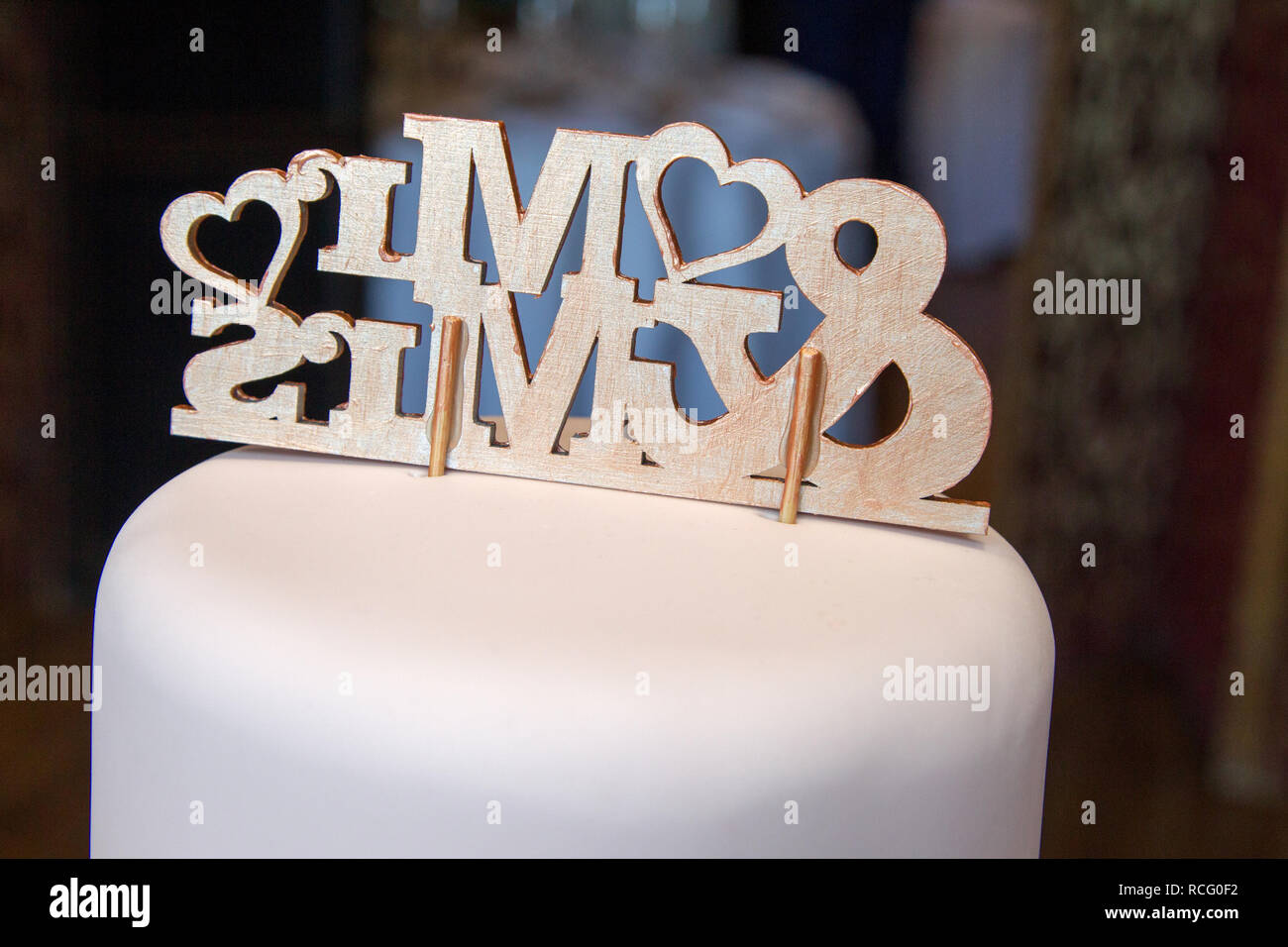 Cake decorations on a wedding cake Stock Photo