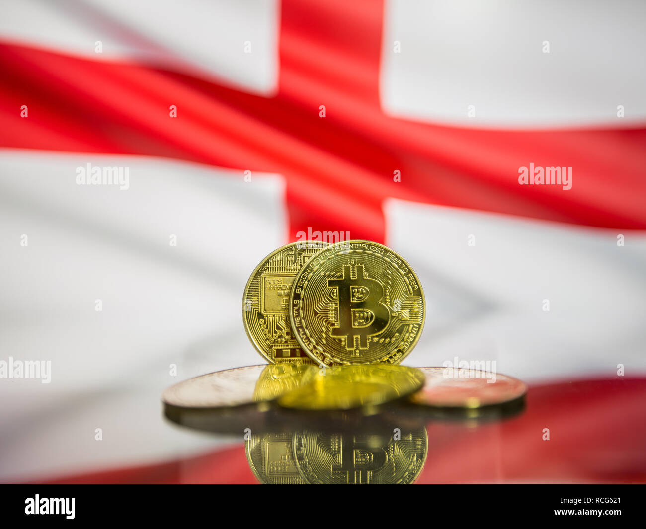 Bitcoin gold coin and defocused flag of England background. Virtual  cryptocurrency concept Stock Photo - Alamy