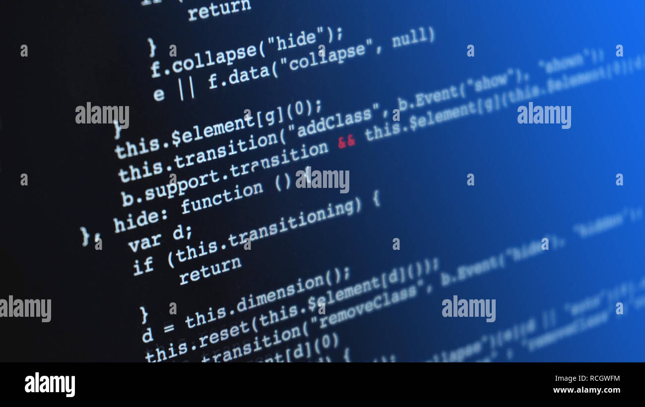 Programming html application code running down a computer screen Stock Photo